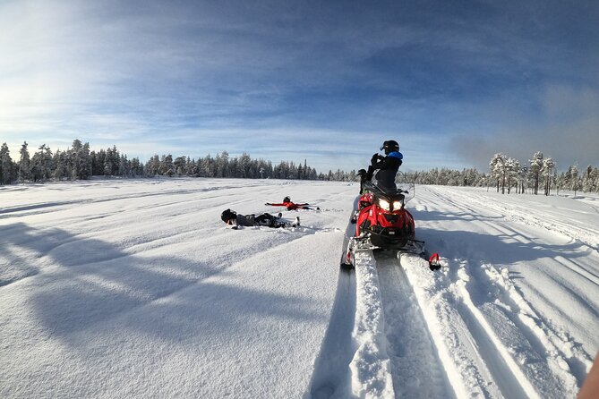 3H Private Snowmobile Experience in Rovaniemi's Forest - Getting dressed for a northern ride
