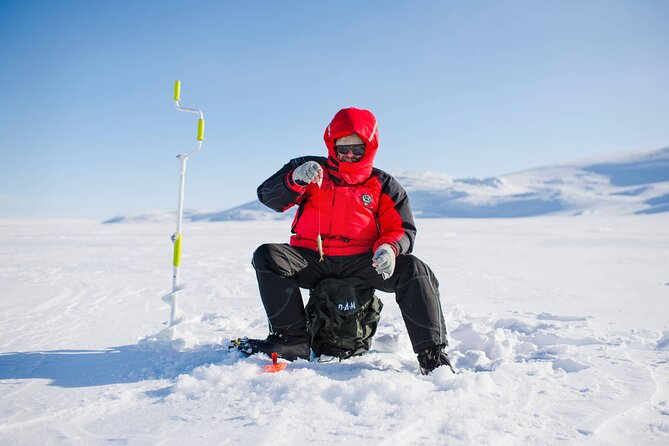 Arctic Fishing & Open Fire Cooking - Checking submerged nets and meeting local fish