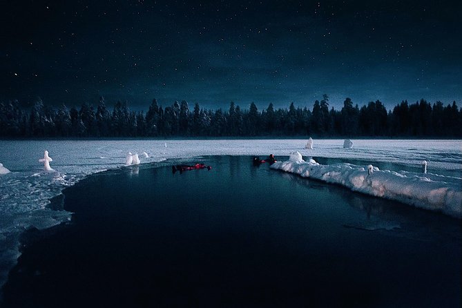 Aurora Ice Floating in Rovaniemi - Getting into the dry suit and frozen water