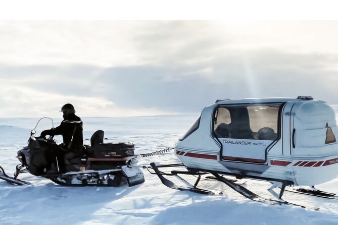 Family Snowmobile Safari in Rovaniemi - Pickup, clothing, and the trip to the base