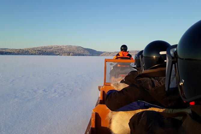 From Ivalo: Ice Fishing Safari to Lake Inari, reindeers & lunch - A snowmobile-drawn sleigh ride with a useful purpose