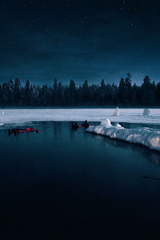 From Rovaniemi: Ice Floating under Aurora Borealis - Guides, safety, and the human touch