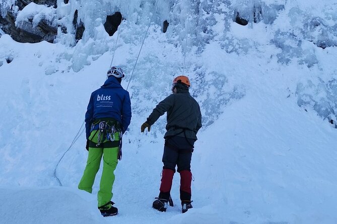 Guided Ice Climbing Activity in Pyhä - Bonfire and hot berry drinks between attempts
