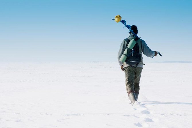 Ice Fishing and Husky - Two Lapland favorites in about four and a half hours