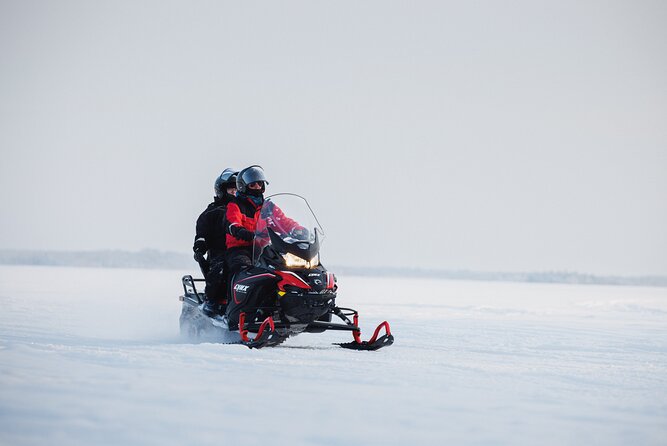 Ice Fishing and Snowmobile Safari Combo in Lapland - The snowmobile ride across the Arctic scenery