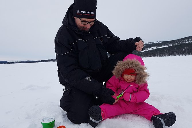 Ice fishing by car with hot beverages at Pyhä-Luosto - The scenery is part of the catch