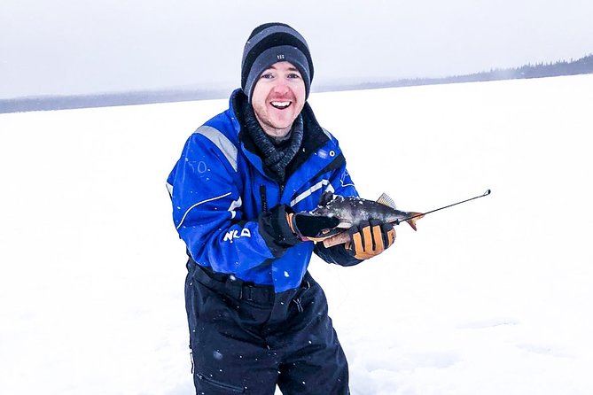 Ice Fishing Trip in Rovaniemi - Taking photos on the frozen lake or river