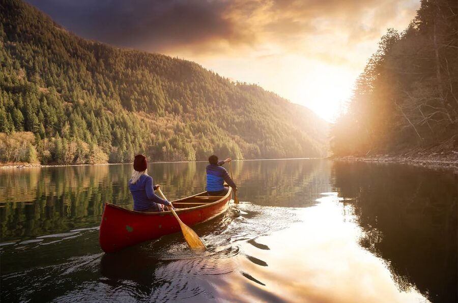 Lapland: Canoeing Trip with Reindeer and Husky Farm Tour - Canoeing through forest to a quiet lake