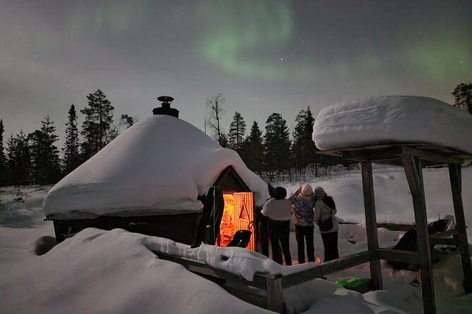 Lapland In A Day - Reindeer, Sledding, Snowmobile & Nature - Riding through snowy forest on a pulled sled