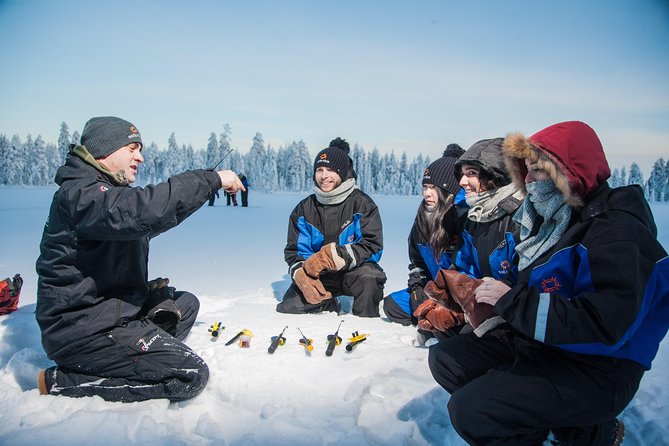Lappish Lunch Break -Snowmobiling, ice fishing and tasty food - A Snowmobile Ride Beyond Central Rovaniemi