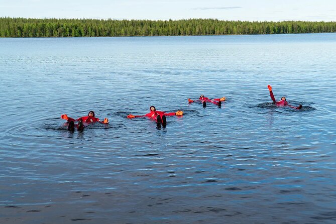 Midnight Sun Floating Experience in Forest Lake - The floating suit changes the whole experience