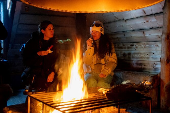 Northern Lights Hunt from Rovaniemi with Folk Tales and Snacks over Campfire - Lappish stories, berry juice, and grilled snacks