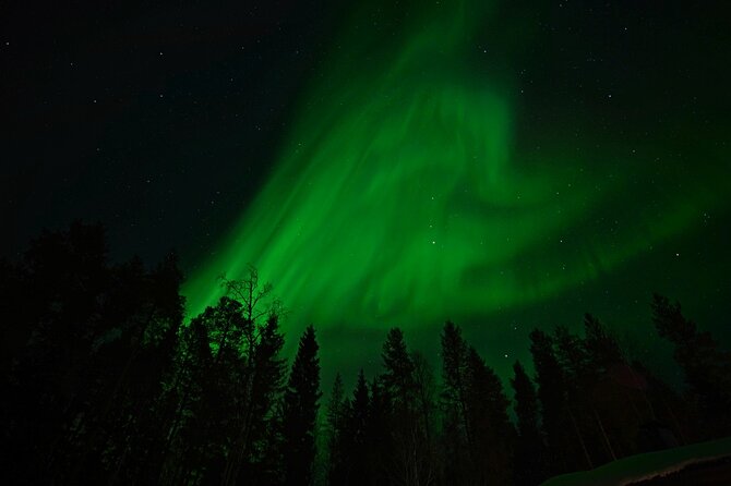 Northern Lights Hunting in Lappish old cottage - The science and stories behind the lights