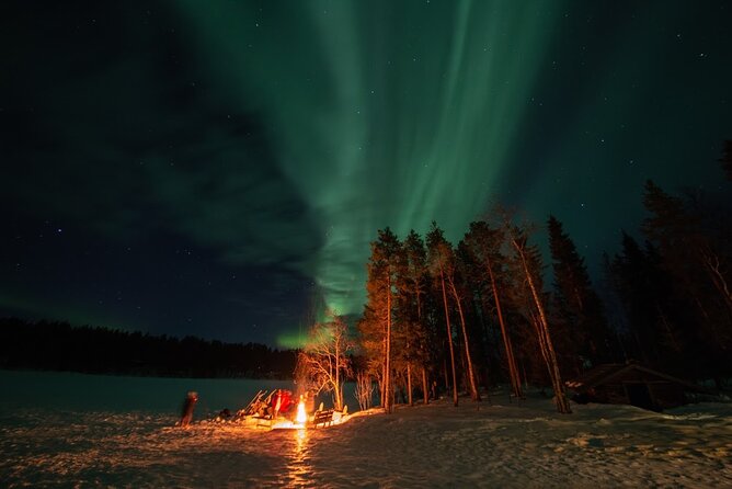 Northern Lights Hunting in Lappish old cottage - A cottage, frozen lake, and northern view