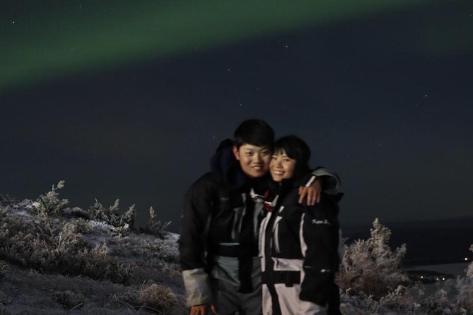 Northern lights hunting with car - A night drive into darker Finnish Lapland