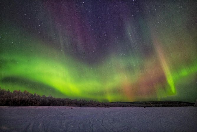 Northern Lights Hunting with Snowmobiles - Stops, hilltops, and the value of darkness