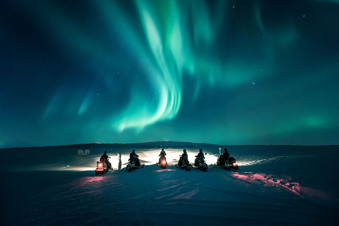 Northern Lights Snowmobile Safari from Rovaniemi with Campfire Picnic - Getting dressed at the base