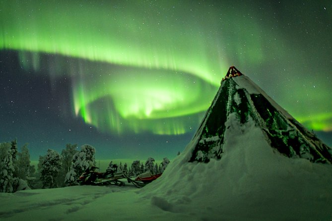 Northern Lights Snowmobile Sleigh Ride - Campfire food, warm drinks, and the tepee
