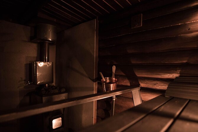 Private Lappish evening in the wilderness with traditional sauna and dinner - The ice dip is brief, bold, and optional in spirit
