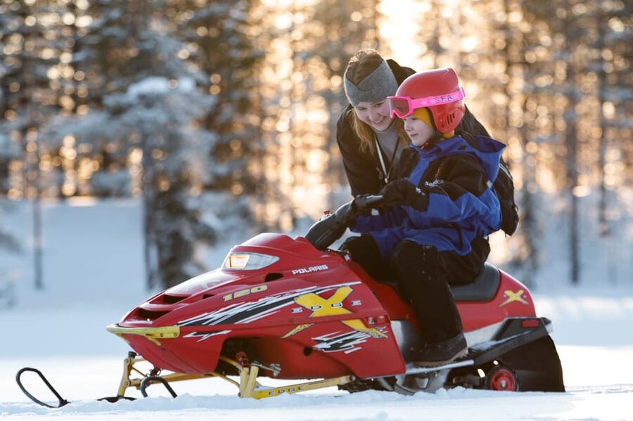 Rovaniemi: Family Snowmobile Trip with Guide and Picnic - The adult ride through the snowy wilderness