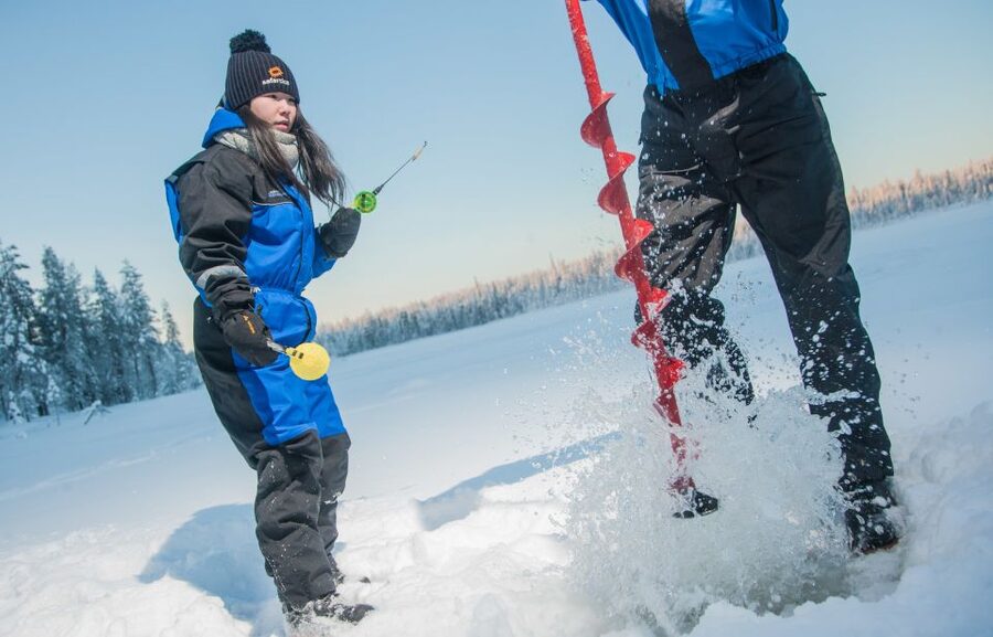 Rovaniemi: Guided Ice Fishing Experience - Getting dressed for two and a half hours outside