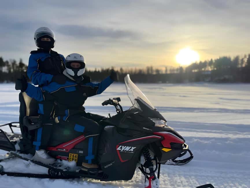 Rovaniemi: Guided Wilderness Snowmobile Safari & Barbeque - Sausages and hot drinks beside the fire