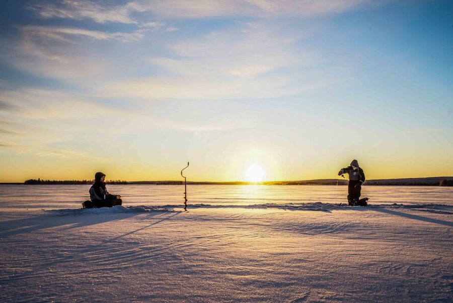 Rovaniemi: Ice Fishing on a Frozen Lake with BBQ and Photos - A frozen lake, a fishing line, and a little patience
