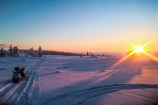Snowmobile Driving - Morning start - Sharing the ride with a passenger