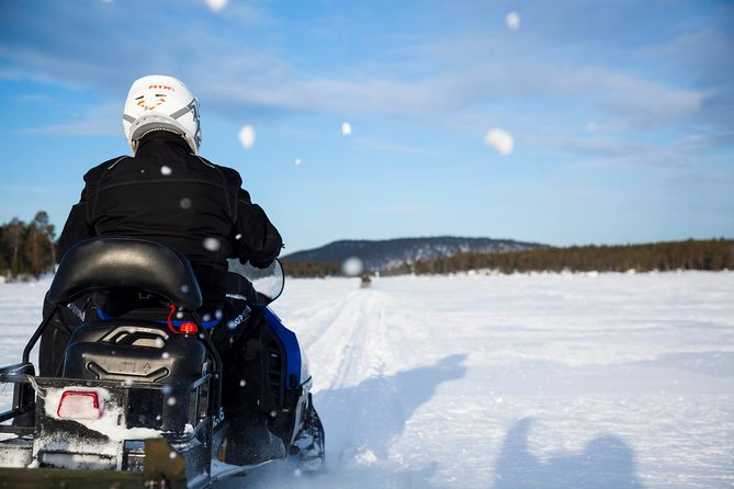 Snowmobile Safari to Lake Inari, meet & feed Reindeers, Lunch - The open white space of Lake Inari
