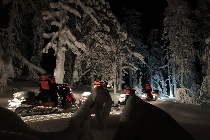 Snowmobile Safari to Search for the Northern Lights - Riding into the Rovaniemi night