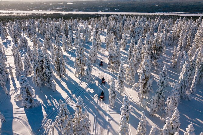Snowmobiles and Huskies - Getting ready at the safari office