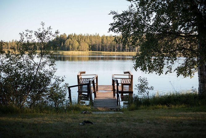 Traditional Lappish evening in the wilderness with dinner - A wood cabin dinner with smoked salmon