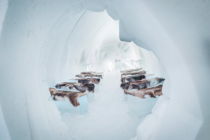 Visiting package: Guided Tour at Arctic Snow Hotel - Ice Bar access, drinks, and food costs
